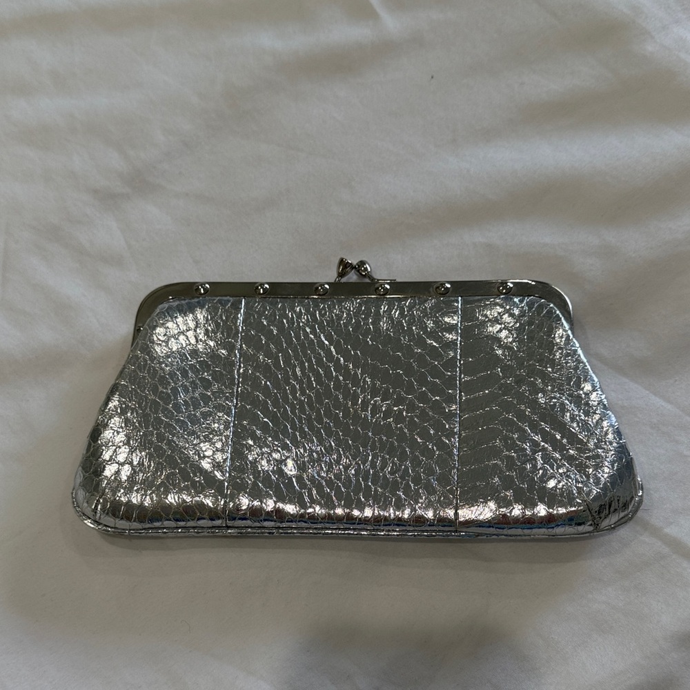 Cache Metallic Silver Clutch
